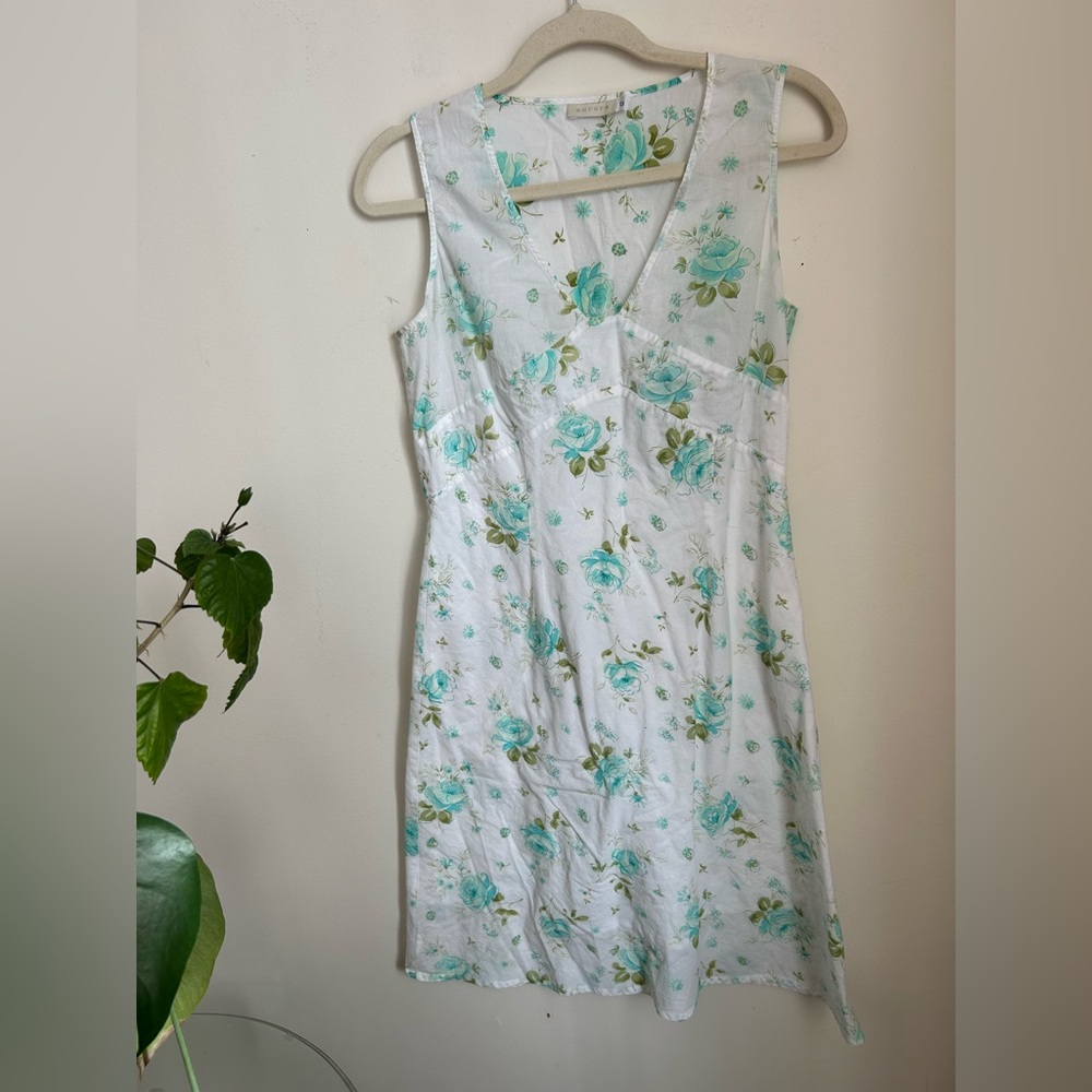 Sleeveless White Dress with Teal Floral Print